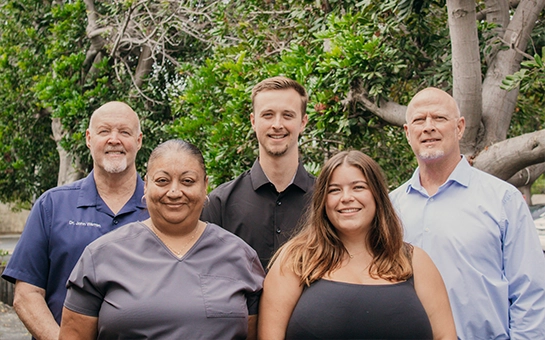 Chiropractors John Warren, Austin Warren, And Daniel Warren With Team